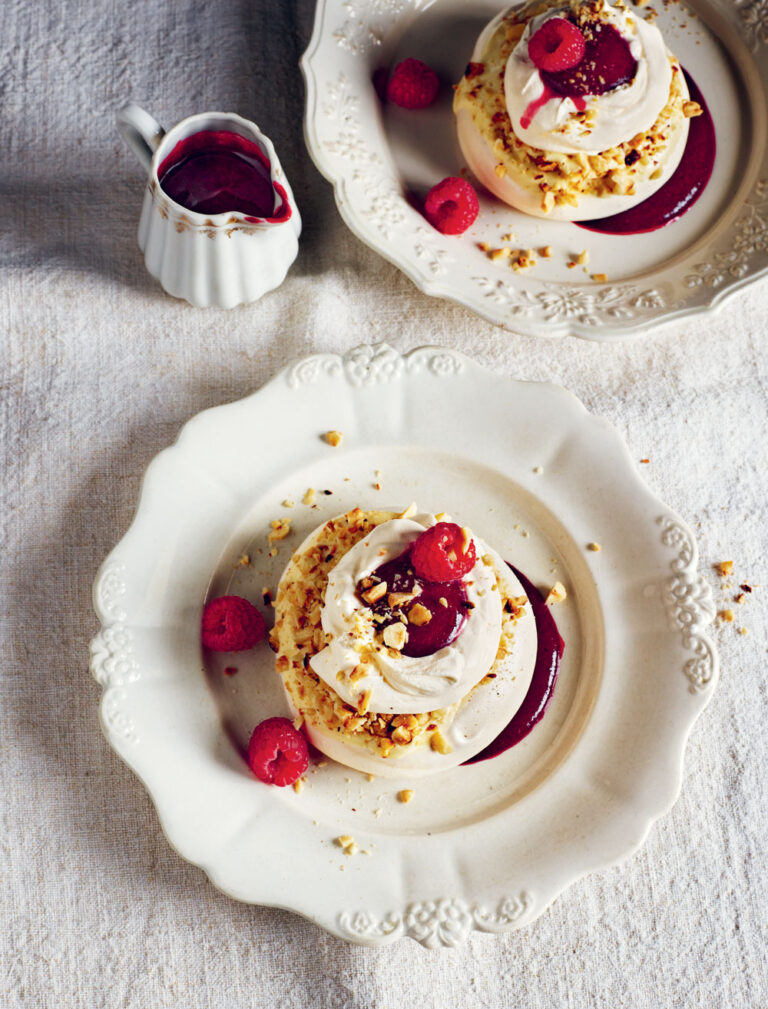 Rick Stein hazelnut pavlovas with white chocolate and dark berry sauce